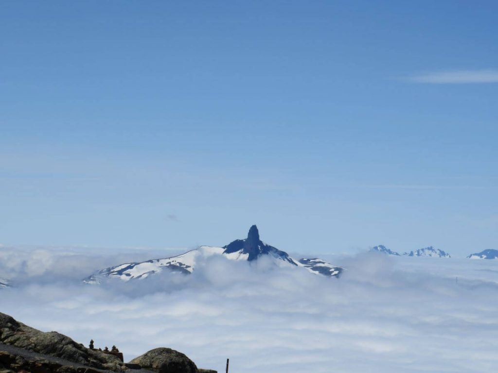 the black tusk on top of a snow covered mountain