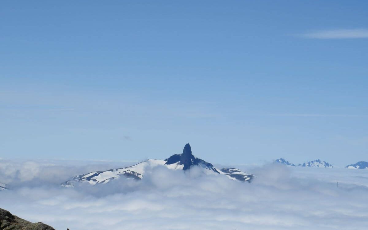 the black tusk on top of a snow covered mountain