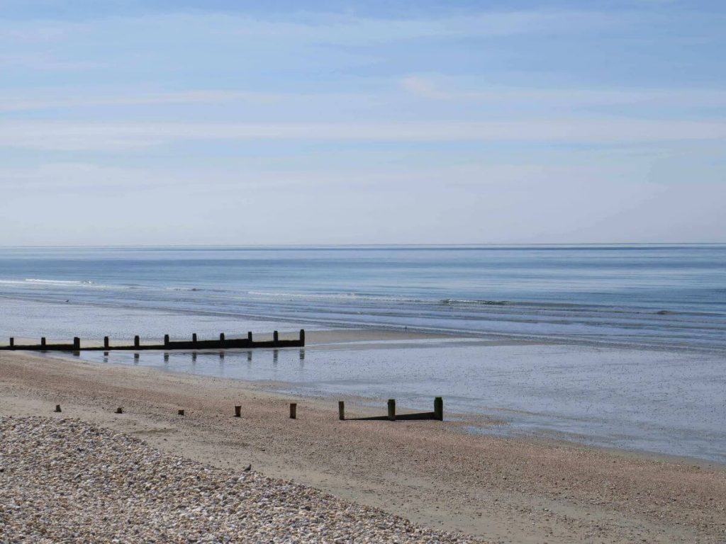 the beach with sea and sand