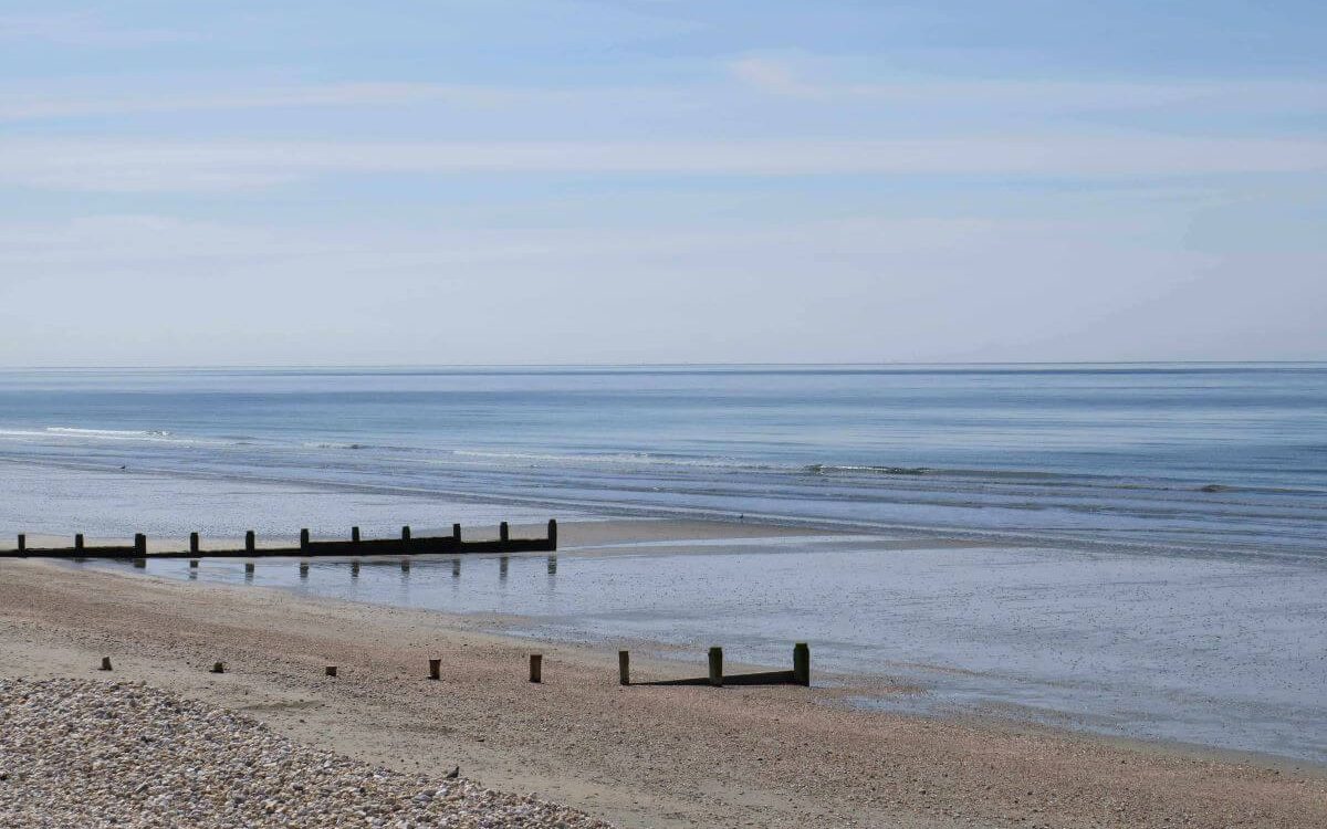 the beach with sea and sand
