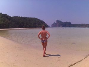 Me standing on a Koh Phi Phi beach, one of the 3 amazing islands in South Thailand