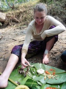 Me eating the fresh fish for lunch on the banks of the Nam Tha River in Luang Namtha, Laos
