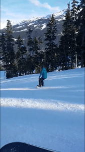 Me snowboarding on a beginner slope on Blackcomb Mountain
