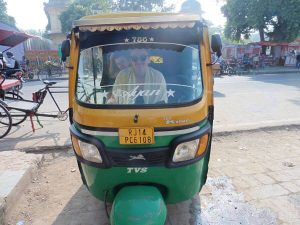 Me sitting in a Tuk-Tuk driver seat in India