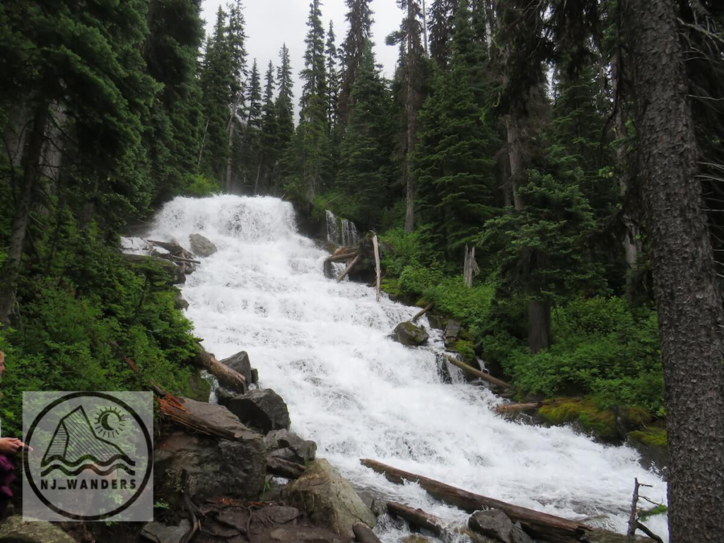 Narin Falls flowing over rocks surrounded by trees