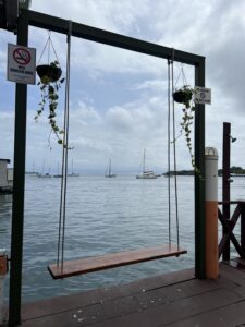 A swing overlooking the sea when visiting Panama in July