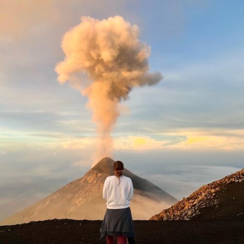 Me standing and watching the sunrise over volcan fuego