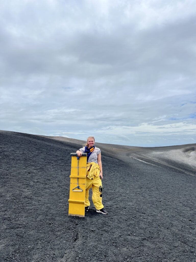 Me getting ready to sandboard down the side of a volcano