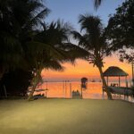 A bright orange and pink sunset over the sea