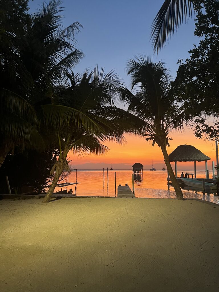 A bright orange and pink sunset over the sea