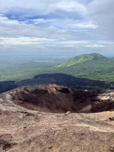 Volcan Negro's Crater with vibrant green forest as the backdrop