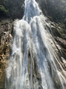 The beautiful water in Mexico gushing over a rock face at a great pace