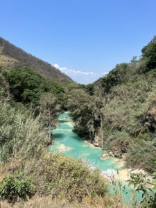 Waterfall Pools lined with lush green forest during the Guatemalan adventures